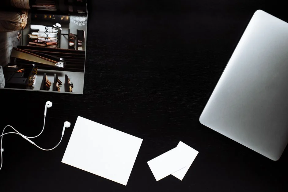 Person shopping online using a laptop and credit card, highlighting e-commerce convenience.